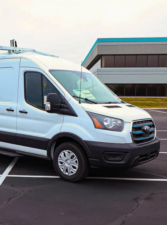 front view of an electric transit bus in white in Dallas Fort Worth